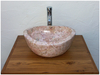 Waschbecken aus rosa Marmor, außen und innen poliert.